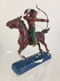Native American on horseback shooting bow